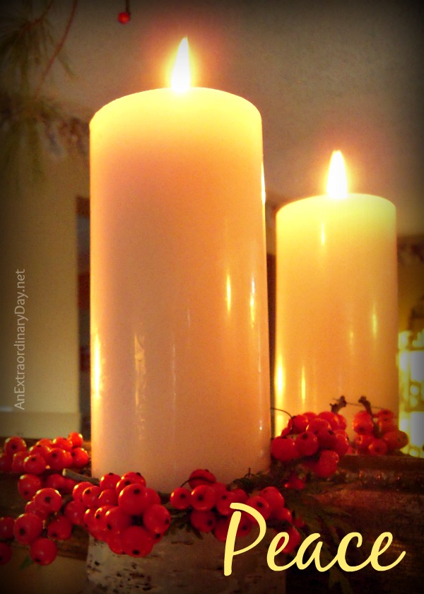 Candle reflection in the mirror for the second Sunday in Advent we light the Candle of Peace.