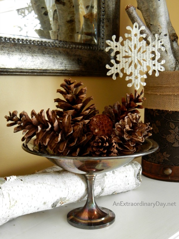 Pine Cones in a Compote and Book Page Snowflakes :: Decorating the Mantel for Winter :: AnExtraordinaryDay.net