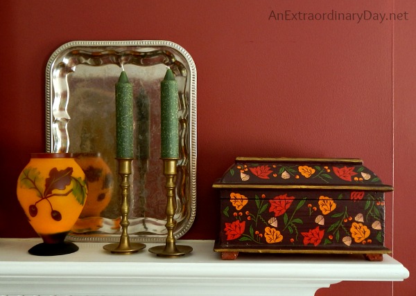 A mantel vignette and tips for dressing a living room for fall.