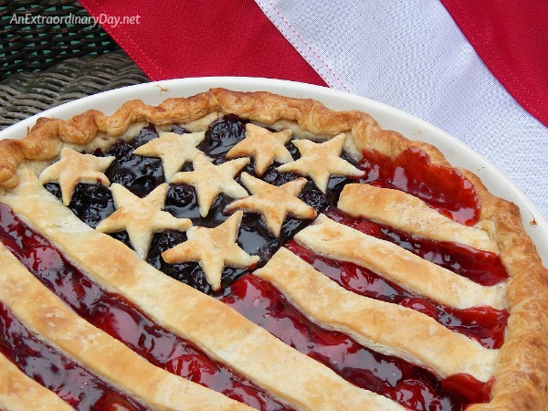 Handcrafted cherry and blue berry stars and stripes American flag pie