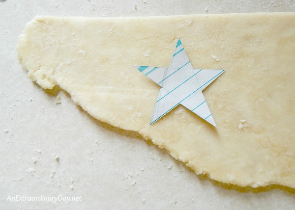 Making pastry stars for stars and stripes American flag pie