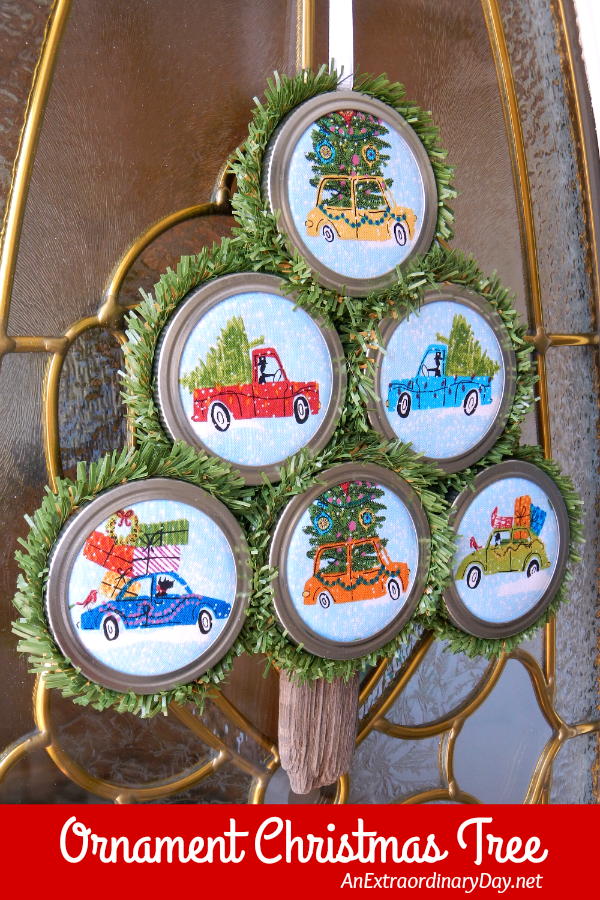 Ball Jar Lid Christmas Ornament Tree Hanger :: I love homemade Christmas ornaments AND Christmas trees on cars so I paired the two together in these easy to make mason jar lid Christmas ornaments. They would be perfect for a young boy's tree or a car-lover's tree and they'd make great gifts, too.