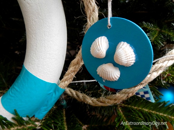 One of Several Unique Ways to Decorate a Nautical Christmas Tree is to use Simple Wood Cutouts and Seashells