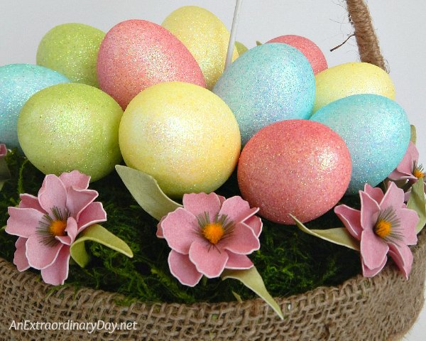 Rim Easter eggs with flowers for a lovely mossy basket 