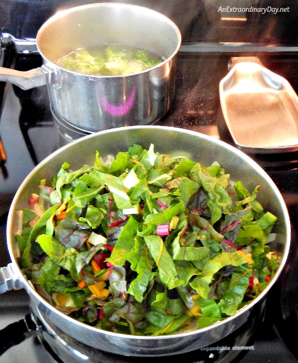 Broccoli Cooking while Swiss Chard is Melting down for this Delicious Rustic Swiss Chard and Garlic Vegetable Saute with Noodles at AnExtraordinaryDay.net