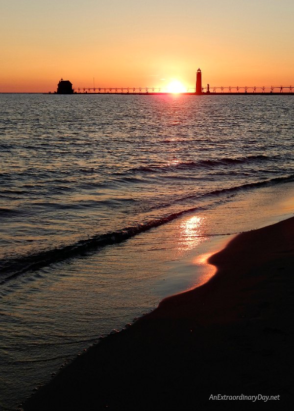 Inspirational Meditation on the Practice of Praise  Beautiful sunset over the catwalk and pier and the Grand Haven Light on Lake Michigan by AnExtraordinaryDay.net
