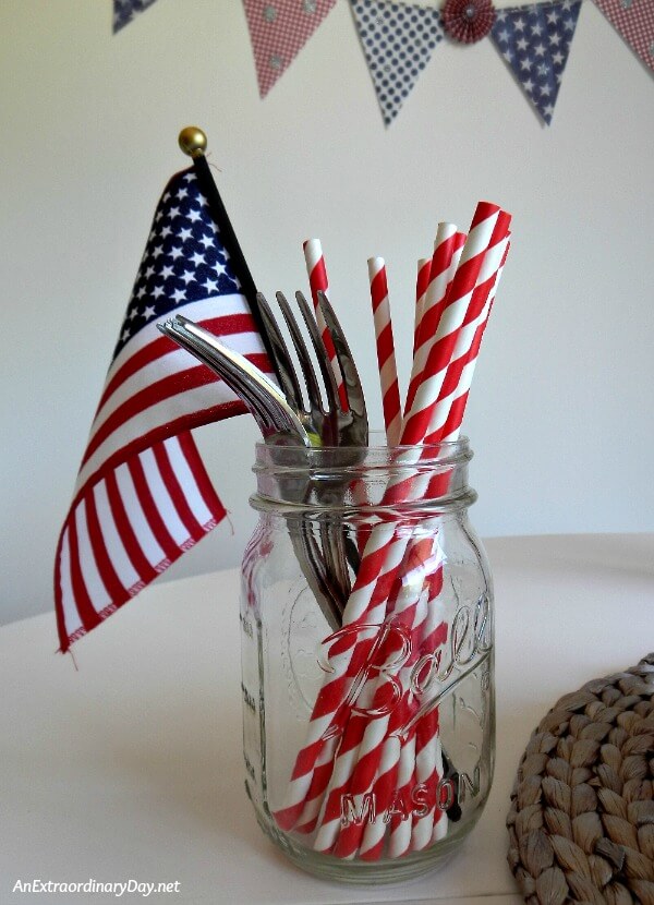 Corral dessert forks and colorful straws in a mason jar for some no-fuss holiday fun. For more ideas visit AnExtraordinaryDay.net