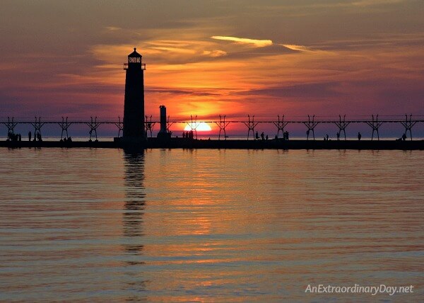 Lake Michigan Sunset at Grand Haven State Park - Join me for a devotional about walking in faith through tough times - AnExtraordinaryDay.net