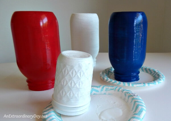 Paint mason jars in red and white and blue - AnExtraordinaryDay.net