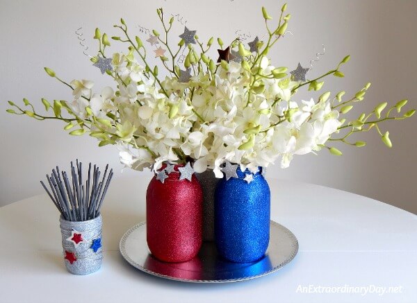 Sparkling Star-Studded Spectacular Fourth of July Floral Arrangement in Glittered Mason Jars at AnExtraordinaryDay.net