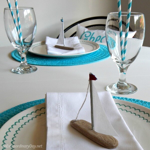 A nod to nautical and beautiful lake blues on the dining table for this small space dining area makeover at AnExtraordinaryDay.net