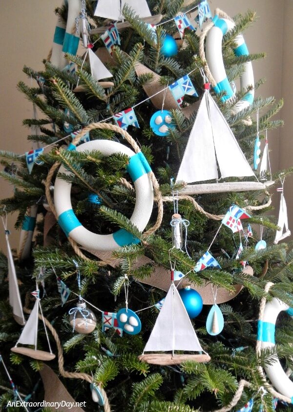 Nautical Christmas Tree filled with Handmade Sailboat Christmas Trees. Get the easy tutorial from AnExtraordinaryDay.net and make a tree-full this year.