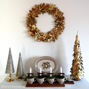 Dress up your home with a classy Christmas wreath made from natural oak leaves and gold paint. AnExtraordinaryDay.net