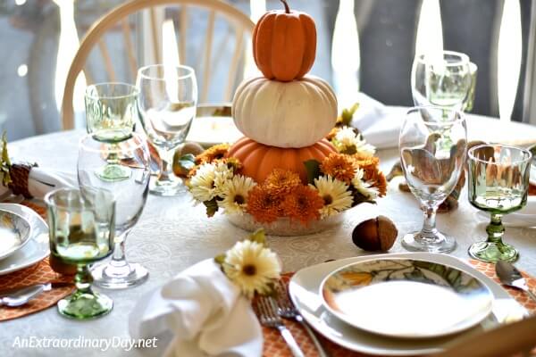 Mix fresh and faux flowers together for a budget friendly Thanksgiving centerpiece