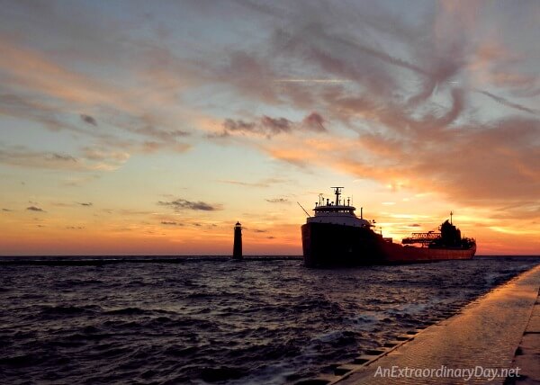 Ship coming in to a Lake Michigan channel | Devotional to help you overcome fear from AnExtraordinaryDay.net