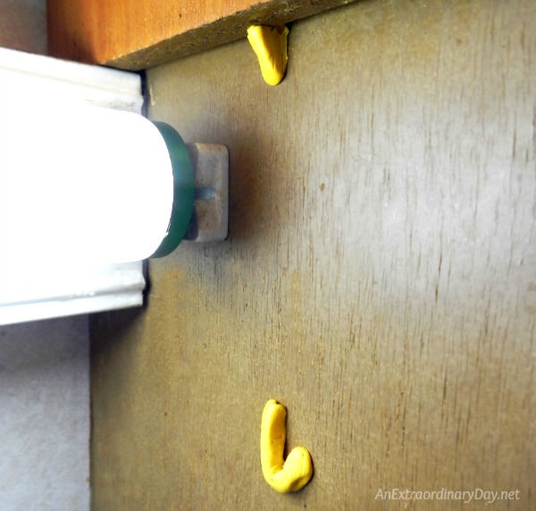 Making hooks to hang a fluorescent shade with Sugru 