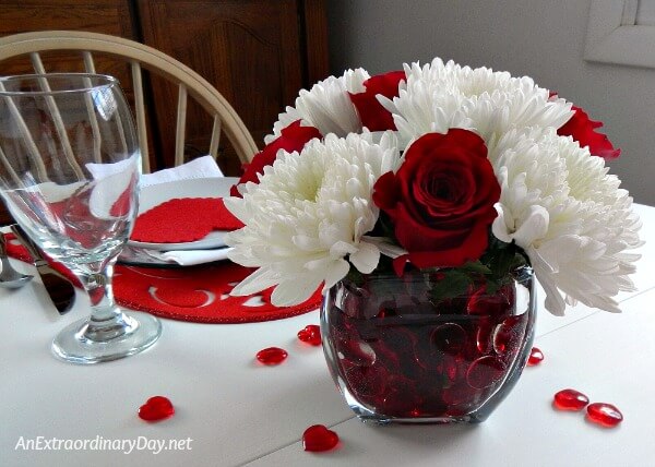 An easy to make centerpiece is a stunning addition to these valentine table decorations