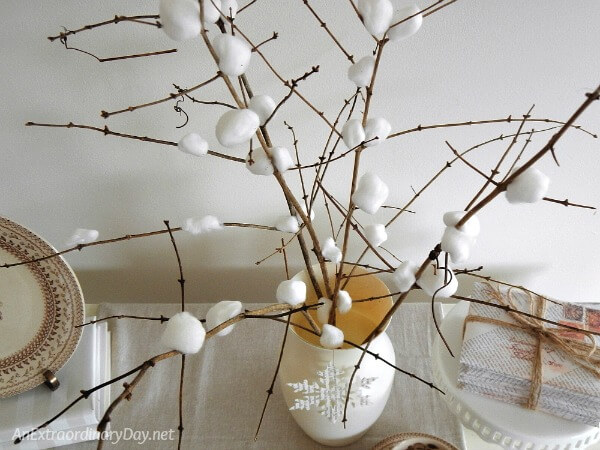Pretty snow covered branches in this wintry vignette
