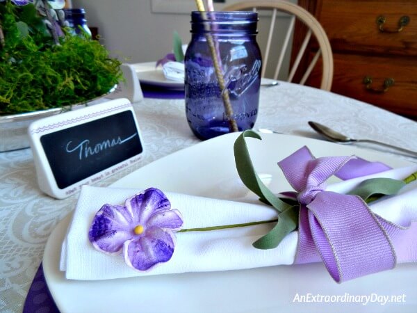 Pretty Purple Ball Jars, Grosgrain Ribbon, Faux Flowers Make the Purple for this Purple Mother's Day Table