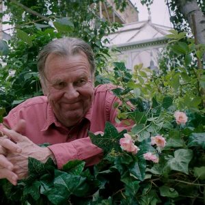 A MOVIE REVIEW OF THIS BEAUTIFUL FANTASTIC starring Alfie (Tom Wilkinson). Here he is over the fence smiling at Bella and her antics - Reviewed on AnExtraordinaryDay.net