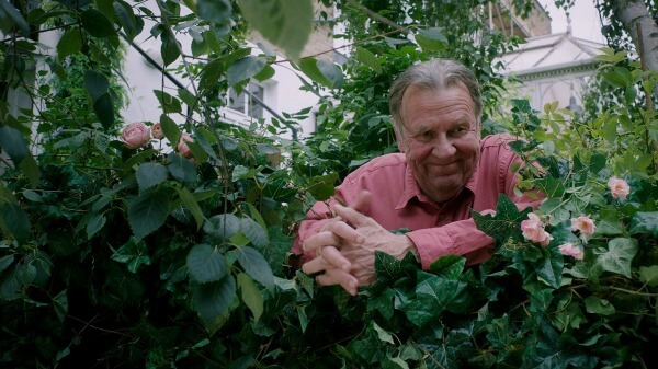 From This Beautiful Fantastic movies starring Alfie (Tom Wilkinson) over the fence smiling
