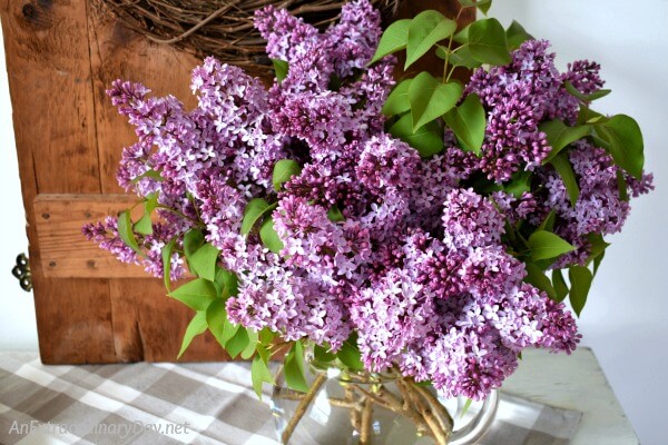 Rustic Spring Vignette featuring a Fresh Lilacs Bouquet