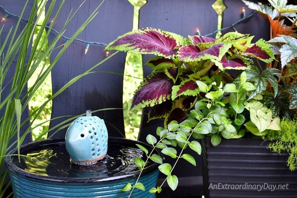 Create a summer oasis with a container garden and a simple water fountain 