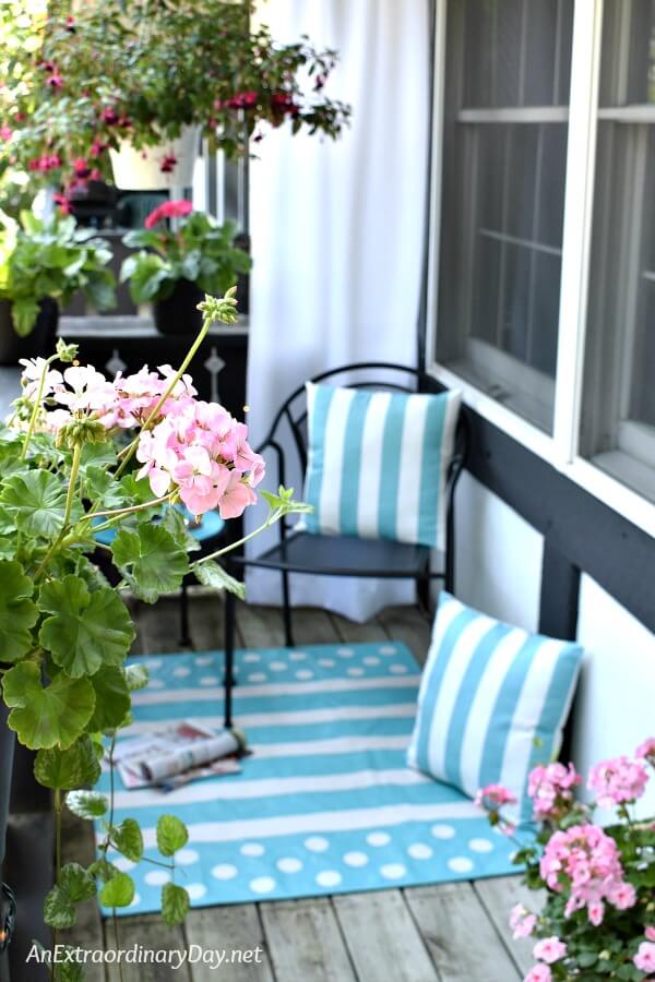 Transform your small outdoor space with a hand painted floor cloth rug in an afternoon 