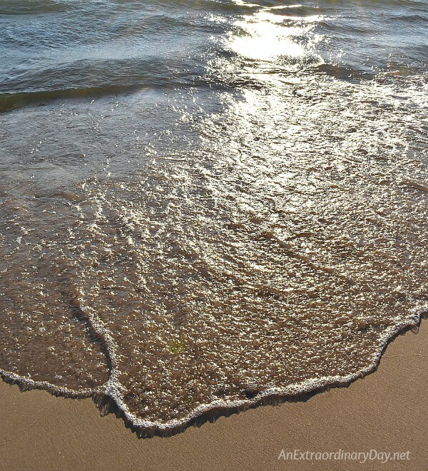 Wave bubbling up on the shoreline