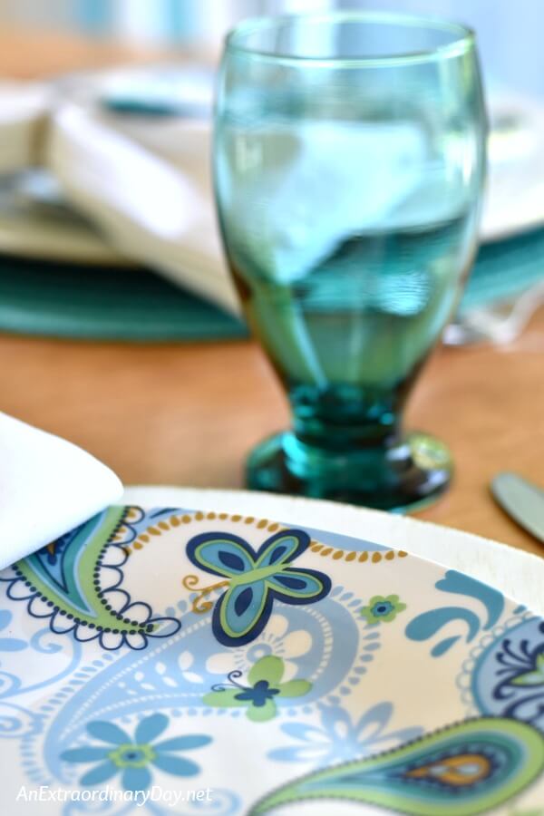 Dollar Tree Goblets Plates and Placemats help set the stage for a Cheap Turquoise Tablescape