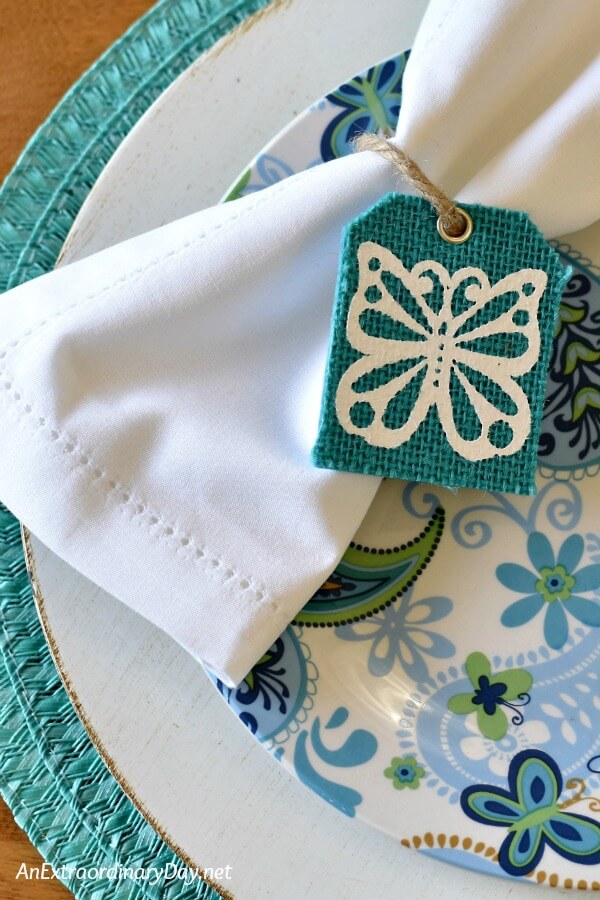Simple Gift Basket Tags Make Terrific Napkin Rings in this Cheap Turquoise Tablescape 