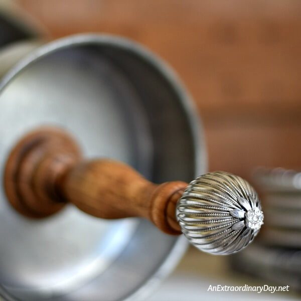 Metal knob with a bit of glitz makes the perfect finial for this farmhouse tray 