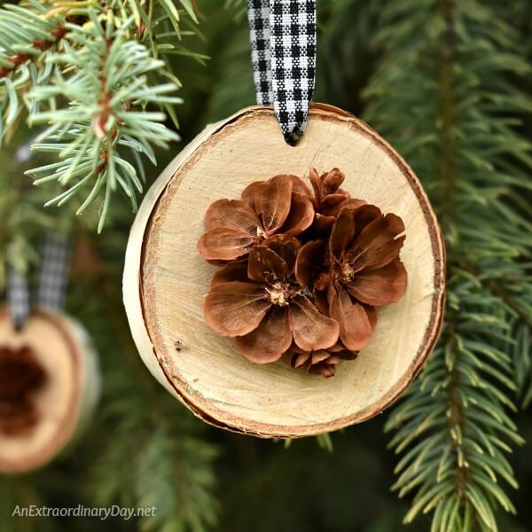 DIY these beautiful simple rustic handmade ornaments from birch wood slices and pine cones - Perfect rustic Christmas tree decorations
