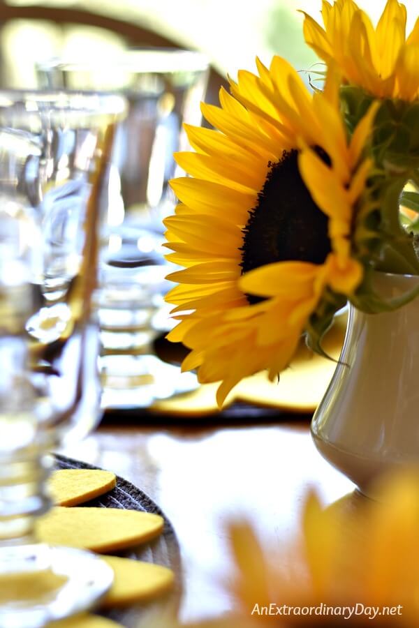 Sunflowers are the perfect happy fall home decor. They make this breakfast table sparkle with drama and color