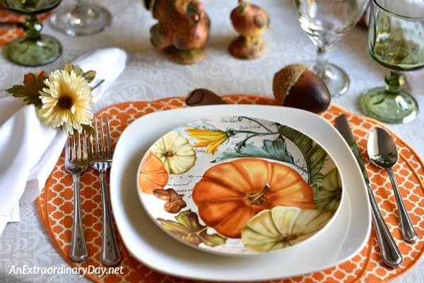 Dollar Tree Plates and Water Goblets with Walmart Pumpkin Plates make for an Inexpensive but Elegant Tablesetting for Thanksgiving Dinner 