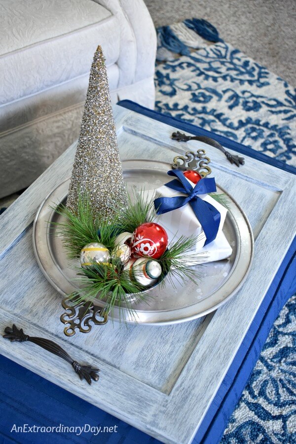 Small Space Decorating Tip Turn your ottoman into a coffee table and decorate it for Christmas 