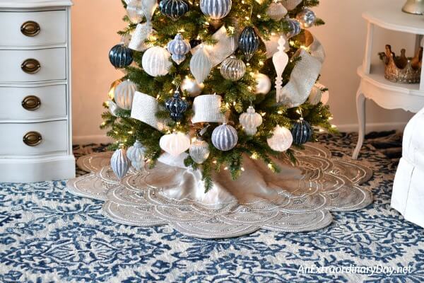 Decorating ideas for how to style a blue and silver Christmas tree with a French country touch 
