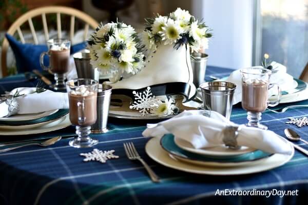 Dark Blue Plaid Throw Sets the Tone for this Ice Skating Themed Winter Tablescape - AnExtraordinaryDay.net