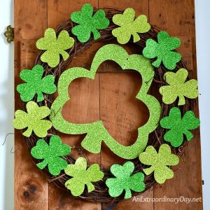 Simple sparkly shamrocks on a grapevine wreath for St. Patrick's Day - AnExtraordinaryDay.net