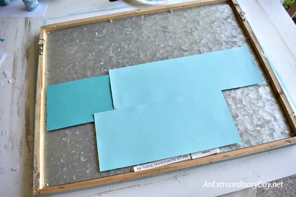 Adding scrapbook paper to the back of the cut out sign letters - AnExtraordinaryDay.net