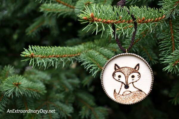Cute woodland fox burned into a wood disk to create a hanging Christmas Ornament - AnExtraordinaryDay.net