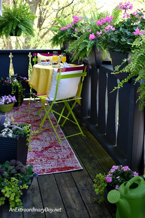 Narrow Outdoor Balcony Decorated for Summer Dining with Bistro Set