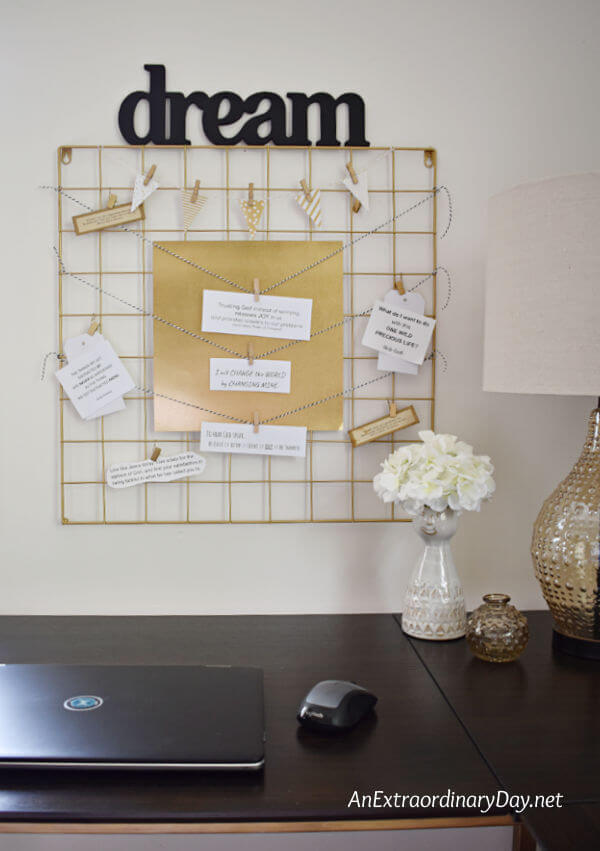 Decorative goldtone metal grid wall decor for the home office wall.
