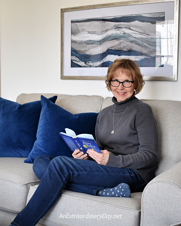 Author enjoying the comfort of her new loveseat and the confidence to decorate as she wishes. 